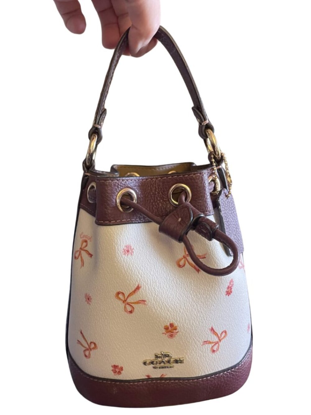🎀Coach Dempsey Drawstring Bucket Bag With Bow Print~Used~Missing strap🎀